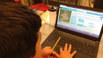 Picture of the children learning Computing